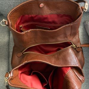 I’m selling three delicately used designer purses